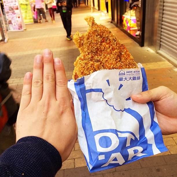 A fried chicken cutlet bigger than a hand at Hot-Star