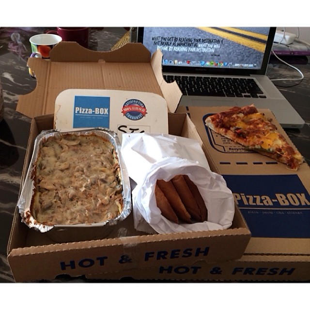 A delivered pizza lunch in Hong Kong