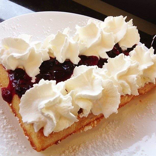 A Brussels waffle with fruit compote in Victoria