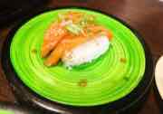 Kura Revolving Sushi Bar photograph by Roger Ma