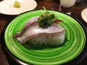 Kura Revolving Sushi Bar photograph by Roger Ma