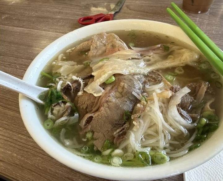 Pho Hoa visit photograph by Roger Ma